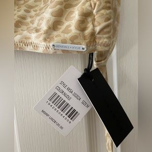 Kendall and Kylie Bikini Top - Style: KKSA-10202 Size: M
Color: Nude, White